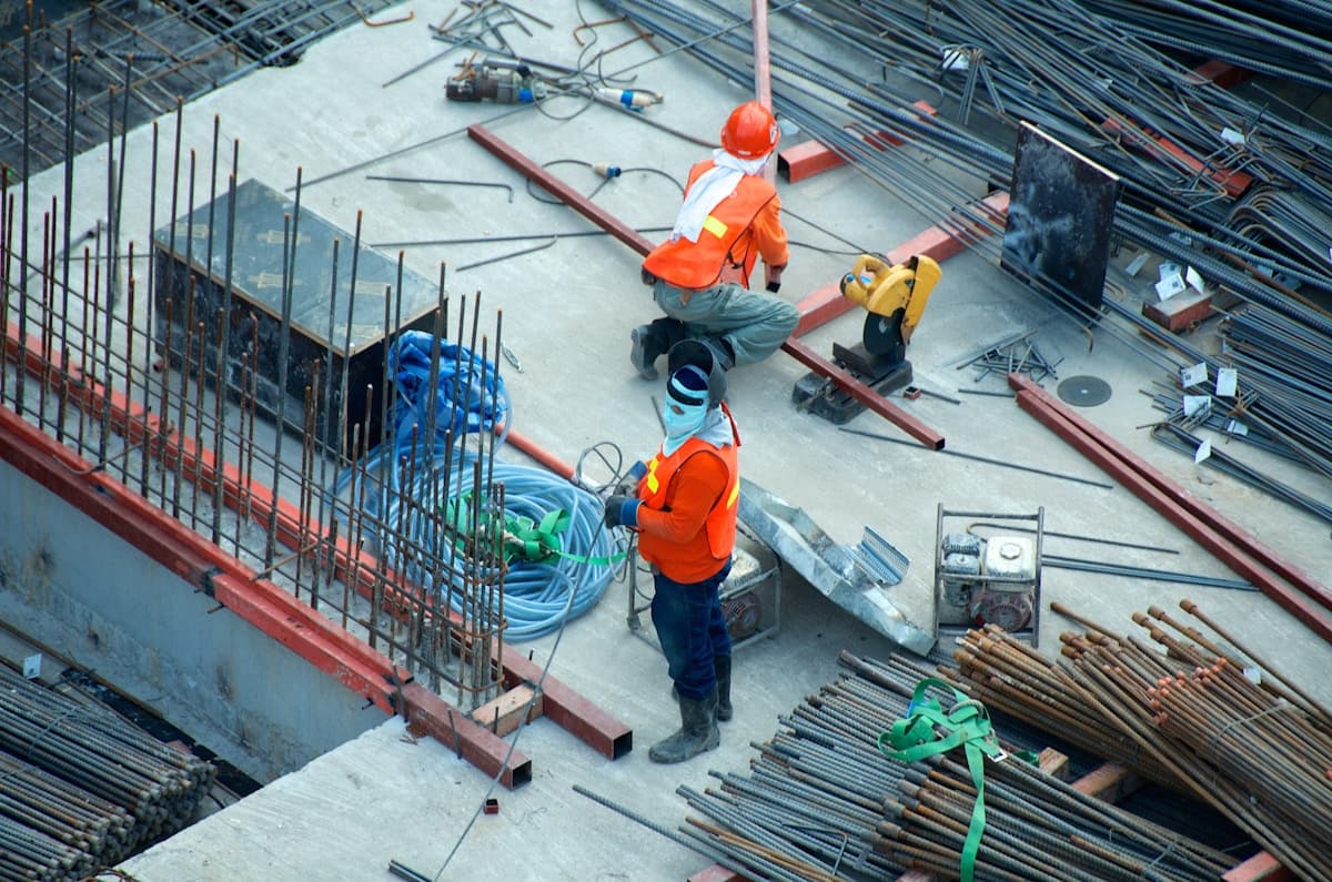 Workers on an active construction site — Prefab Fast Track program imagery