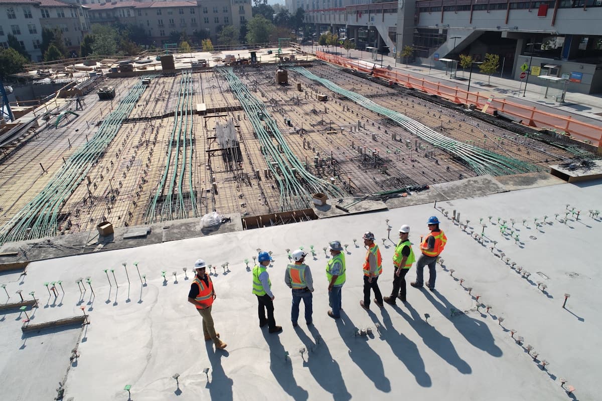 Hard-hat crew on a large prefabricated construction site — Prefab Pro program imagery